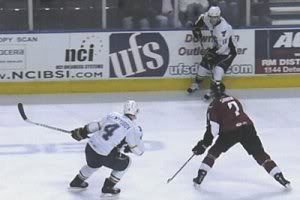 Nikolay Lemtyugov (4) and Julian Talbot work the power play for Peoria vs. the Lake Erie Monsters ('St. Louis Game Time' photo by Brian Weidler)