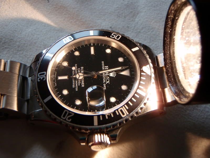 Rolex symbol on online glass